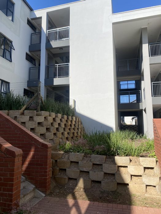 Hayfields Apartment For Sale: 2-bed, open-plan living, private balcony, clubhouse access.