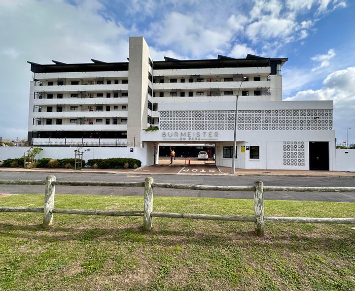 For Sale: Milnerton Central Apartment with beach access, security, and Airbnb potential.
