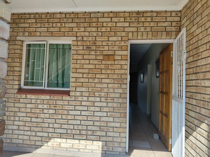 3-Bedroom Apartment For Sale in Brits Central with parking and secure access.