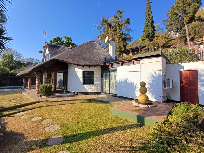 For Sale: 3-Bedroom House in Kosmos with waterfront access and dual accommodation wings.