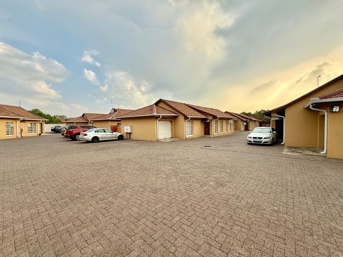 Townhouse for Sale in Cosmosrand: 2 beds, garage, communal jungle gym.