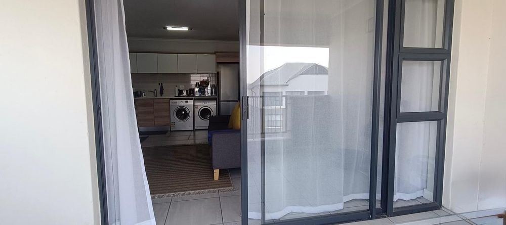 View from Balcony Looking into Apartment