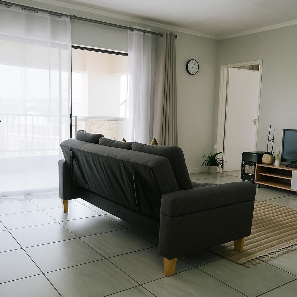 Open Living Area Leading Onto Patio