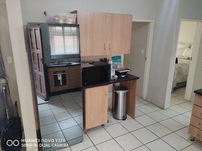 Kosmosdal Apartment For Sale: 2-bed, pool access, secure complex, private patio.