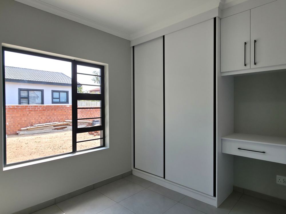 Built-in cupboards in guest room