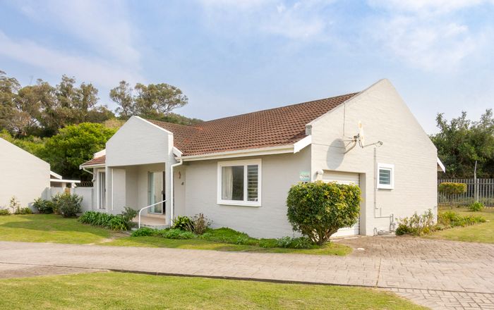 For Sale: East Bank Townhouse with private garden, garage, and open-plan living.