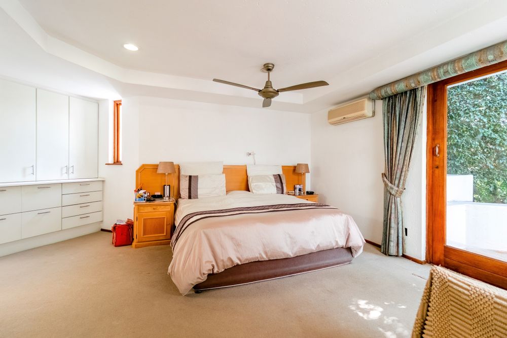 Main bedroom with balcony