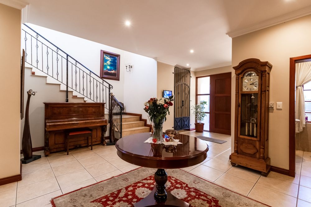 Entrance hall leads upstairs to family bedroom