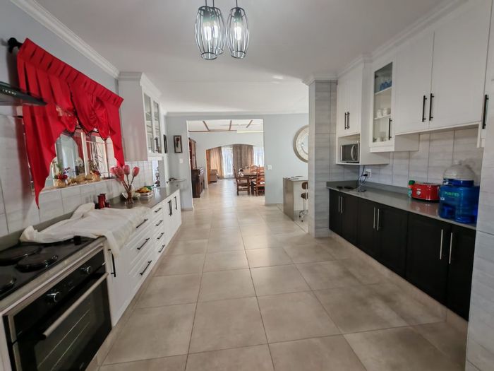 For Sale: Spacious 4-Bedroom House in Sasolburg Ext 23 with double garage.