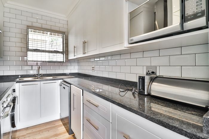 For Sale: 2-Bedroom Townhouse in Northern Acres with security, balcony, and amenities.