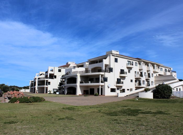 Beachfront apartment in West Beach for sale with direct access and flatlet.