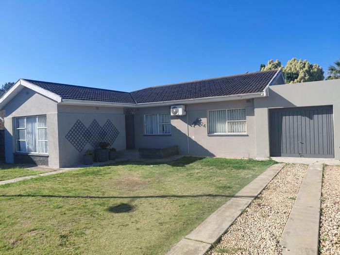 For Sale: House in Retief with 3 bedrooms, garage, and enclosed courtyard.