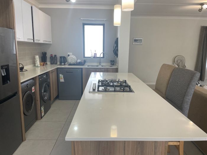 For Sale: 2-Bedroom Apartment in Modderfontein with Pool, Gardens, and Security.