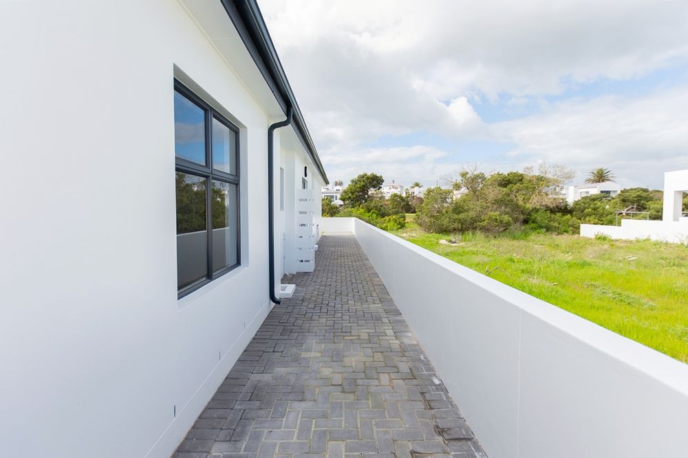 Eastern side of house with wall
