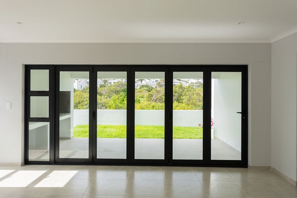 Stacker doors leading to outdoor braai area