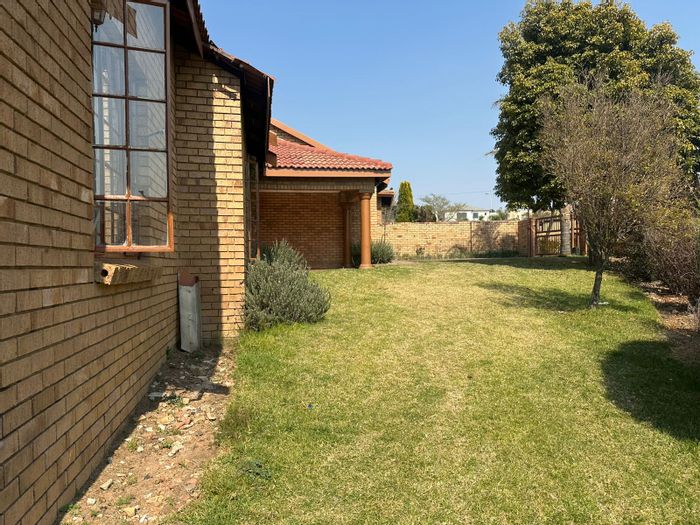 3-Bedroom House in Model Park For Sale with yard, garage, and separate flat.