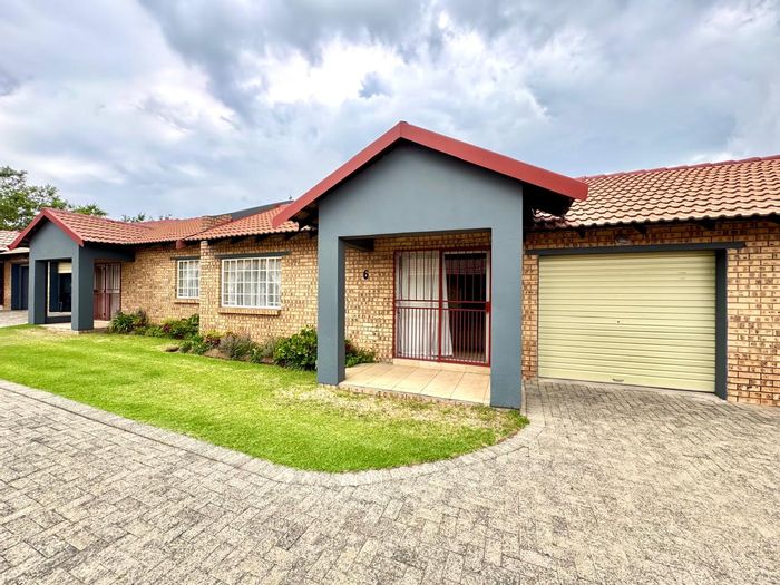 Townhouse For Sale in Cosmosrand: 1 bed, garage, communal braai, secure living.