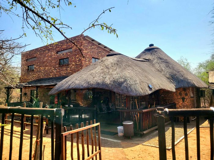 Versatile house with flatlet, splash pool, and solar backup in Marloth Park Central. For Sale.