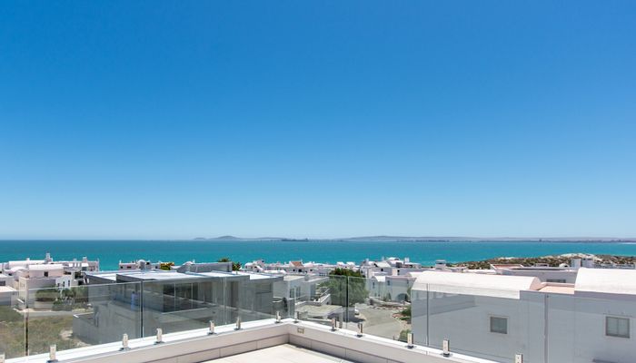 Vacant Land Residential in Paradise Beach For Sale with approved plans and beach access.