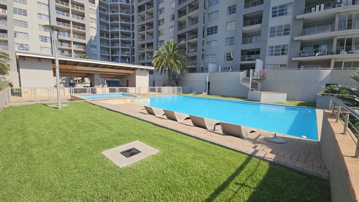 For Sale: 2-bedroom apartment in Sandhurst with balcony, pool, and security.