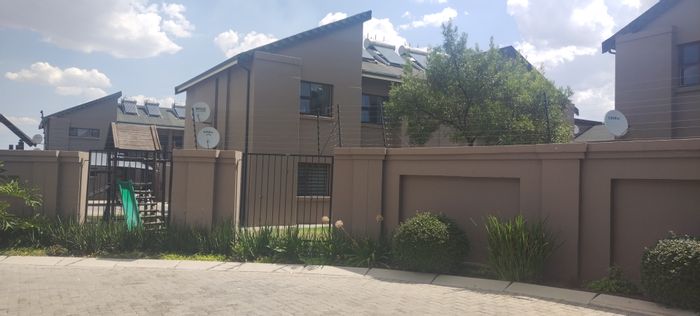 Two-Bedroom Flat To Rent in Helderwyk with secure parking and communal gardens.