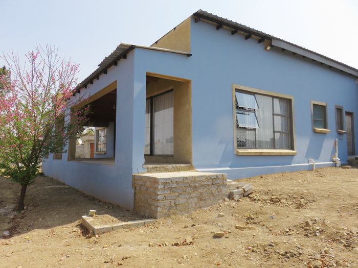 For Sale: House in Deneysville Central with 3 beds, large living spaces, and water views.