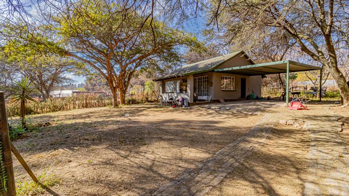 Glen Austin AH Small Holding For Sale: Income potential with cottages and expansive land.