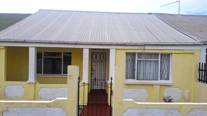 North End Townhouse For Sale: Sea views, backyard parking, and spacious living.