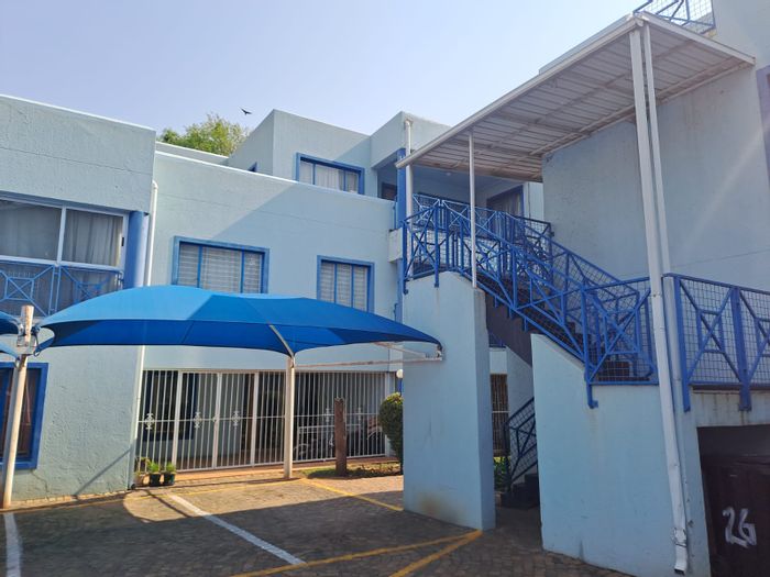 For Sale: Spacious 2-Bedroom Townhouse in Alberton North with Private Patio and Parking.