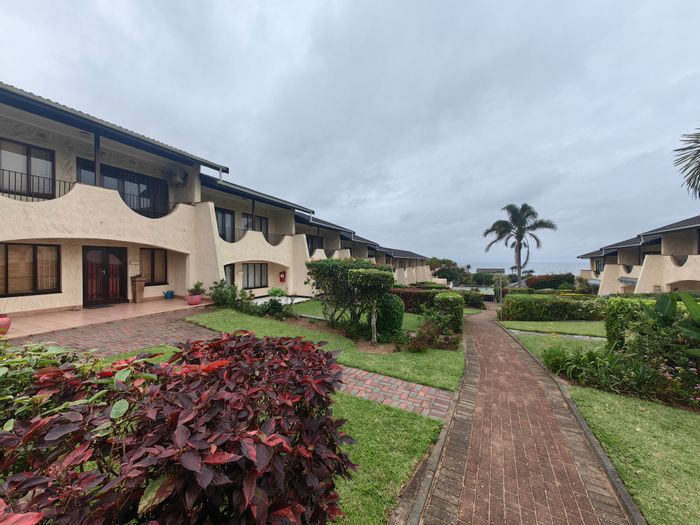 Townhouse for Sale in Scottburgh Central: 2 beds, patio, garden, and parking.