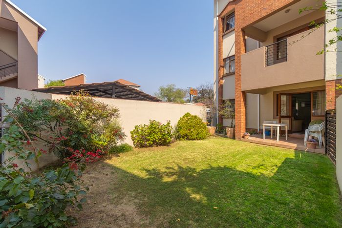 For Sale: Paulshof Townhouse with private garden, pool, and excellent security.