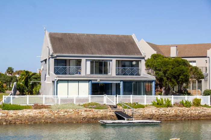 For Sale: House in Royal Alfred Marina with river views, jetty, and four ensuites.