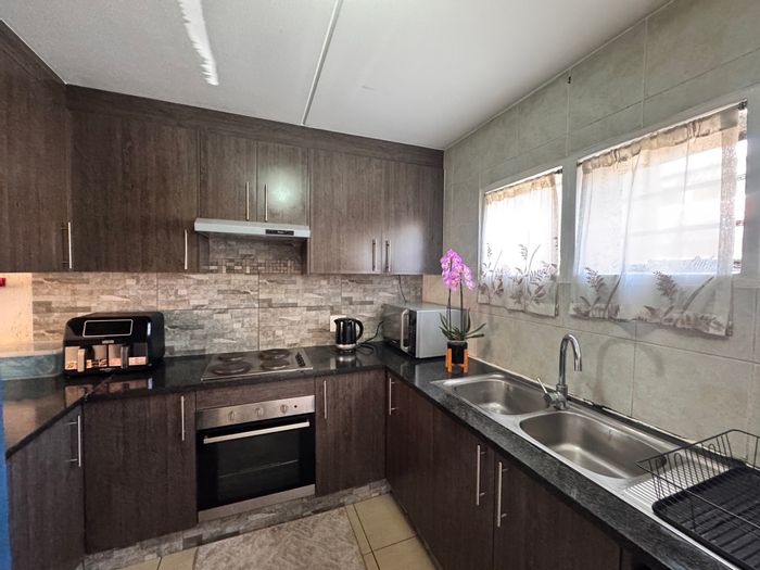 For Sale: 2-Bedroom Townhouse in Mondeor with pool, security, and playground.