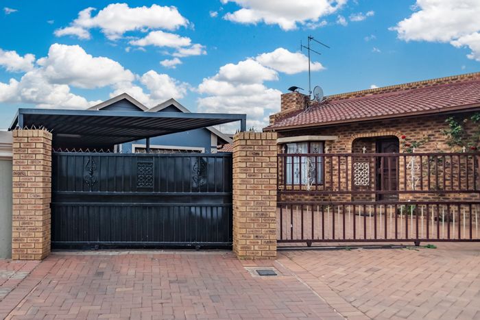For Sale: House in Protea North with 3 bedrooms, secure yard, and convenient amenities.