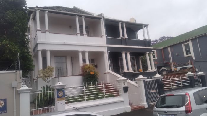 For Sale: Windermere Townhouse with garden, balconies, and versatile living spaces.