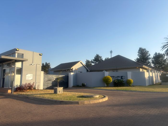 Hoeveld Park Townhouse For Sale: Large garden, open-plan living, double garages.