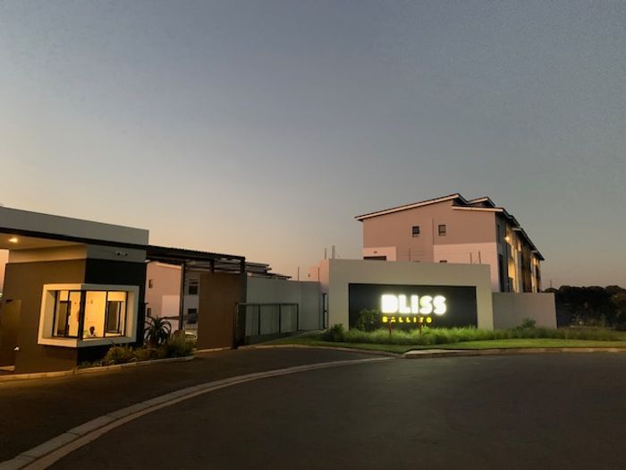 Umhlali Apartment For Sale: Access to gardens, pools, gym, and playground.