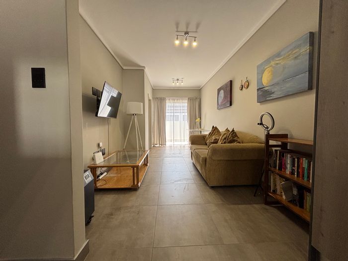 For Sale: Rynfield Townhouse with 2 beds, pet-friendly garden, secure complex.