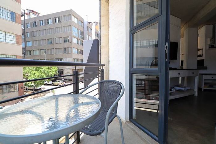 For Sale: 1-Bedroom Apartment in Maboneng with Pool, Security, and Balconies.