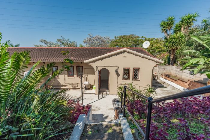 For Sale: Malvern Townhouse with Private Yard, Parking, and Development Potential.