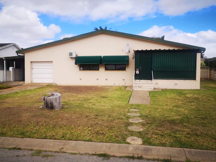 For Sale: House in Bothasrus with spacious garden, security features, and garage.