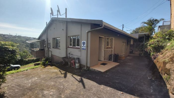 For Sale: Spacious 4-bedroom house in Reservoir Hills with rental unit and expansion land.