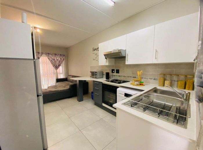 For Sale: Ravenswood Townhouse with pool, garden, and close to amenities.