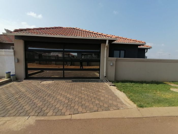 For Sale: House in Lotus Gardens with 3 bedrooms, double garage, and secure yard.