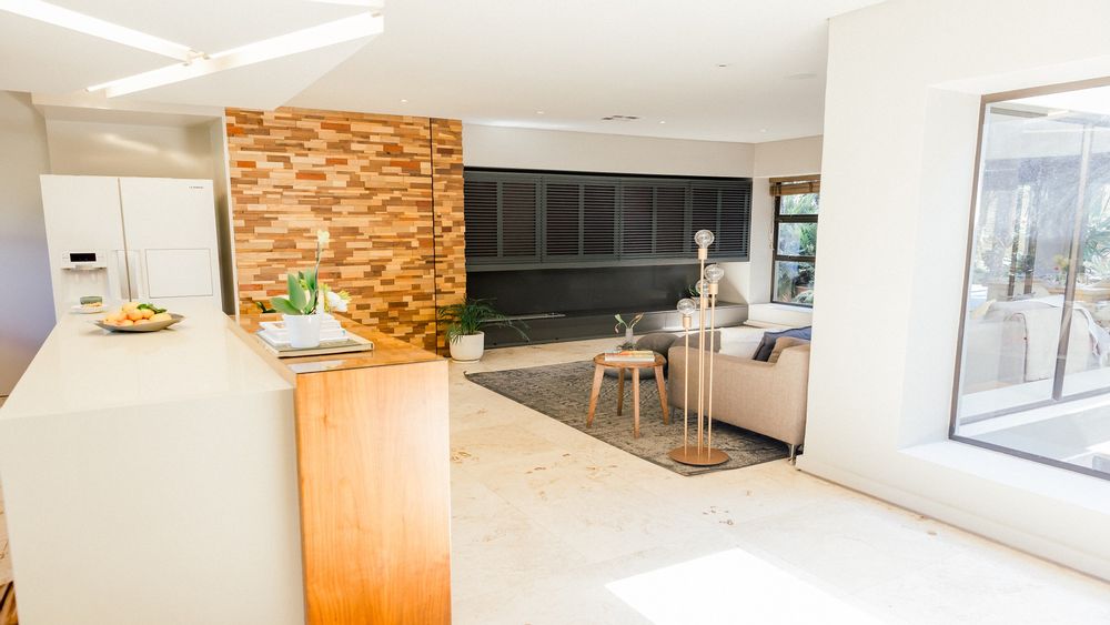 Open plan kitchen with TV room