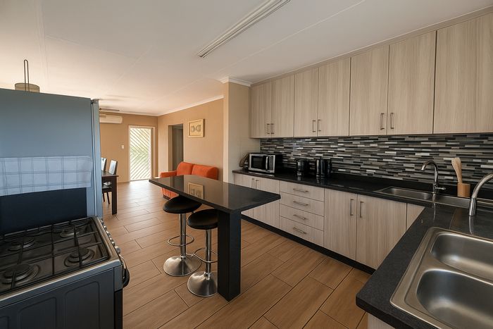 House for Sale in Jordaan Park: 3 beds, security features, solar panels, ample parking.