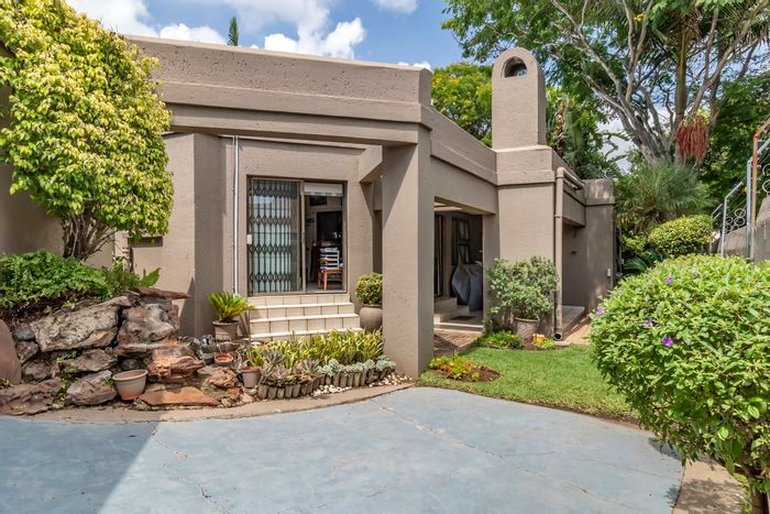Magaliessig House For Sale: Solar energy, rainwater system, jacuzzi, and secure estate living.