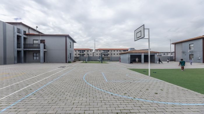 For Sale: 2-Bedroom Apartment in Parklands with Tenant, Secure Parking, Close to Amenities.