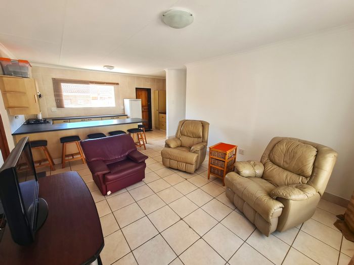 For Sale: Noorsekloof Townhouse with 3 beds, garage, garden, and braai area.