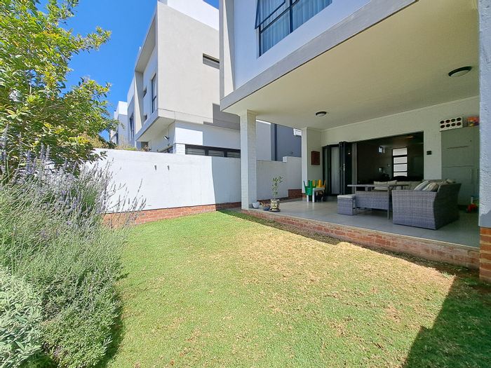 For Sale: 3-Bedroom Townhouse in Sandown with garden, security, and solar power.